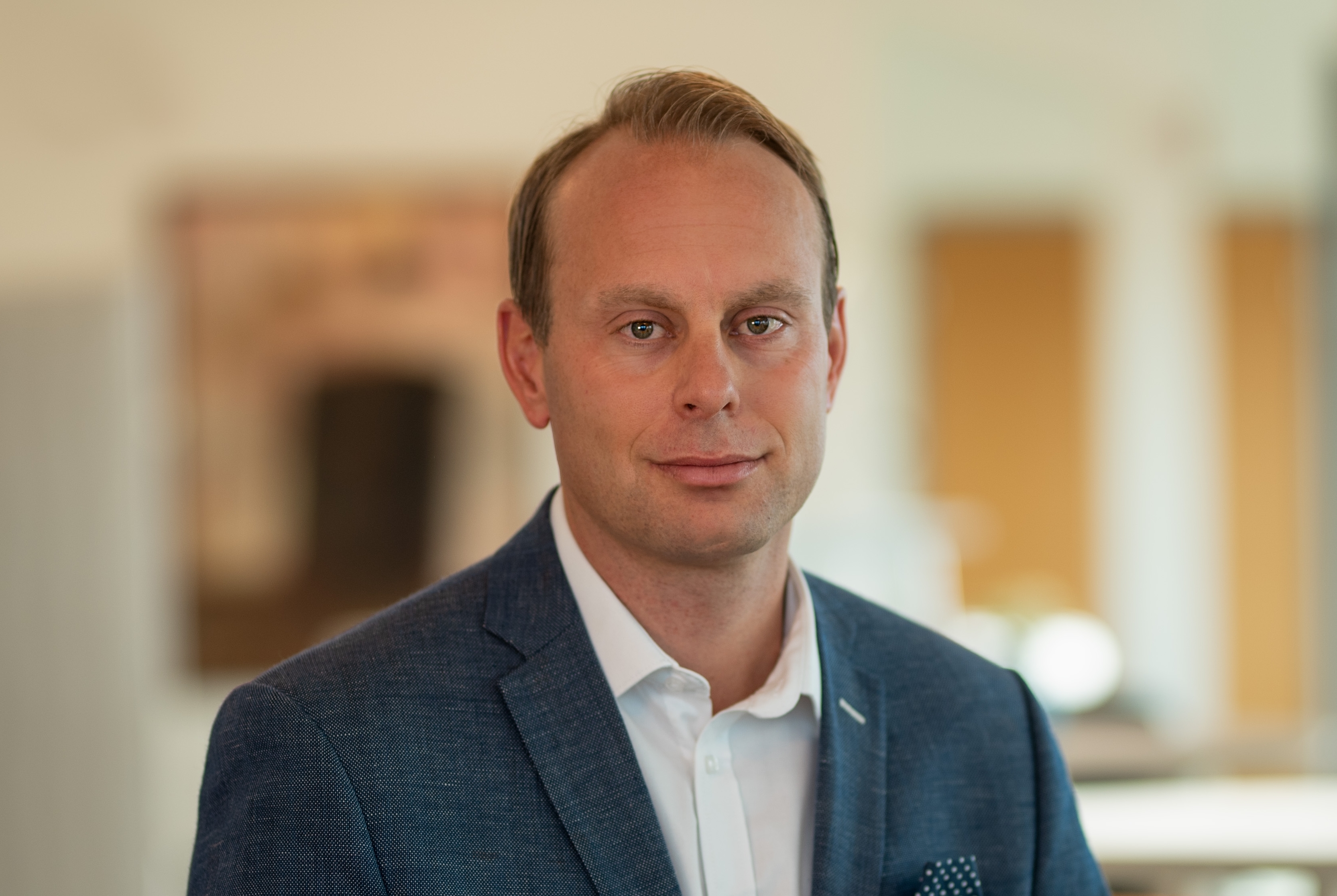 Porträtt på Magnus, private banker